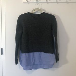 J. Crew Sweater layered with shirt hem